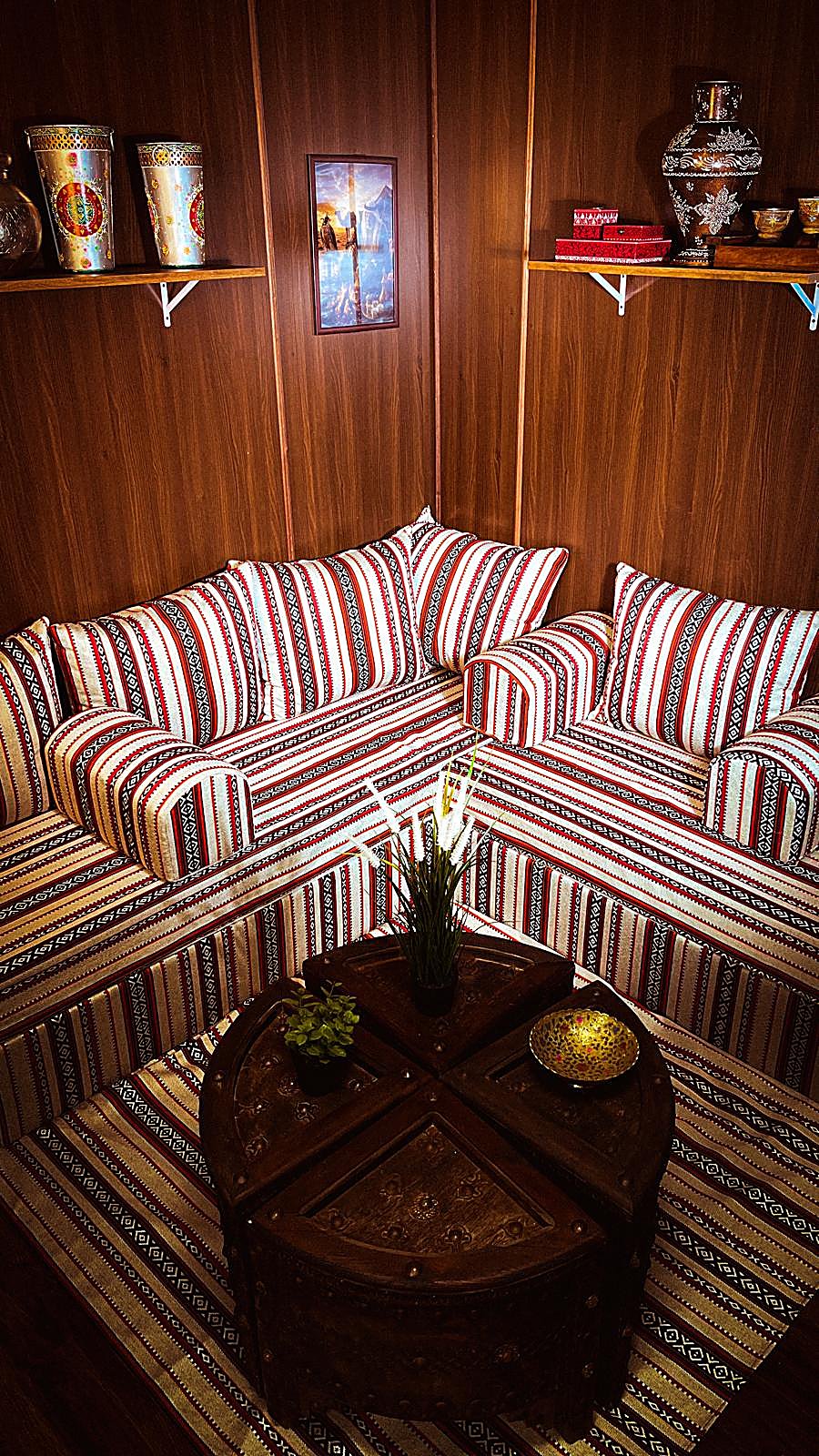 Traditional Qatari majlis corner with guitar detail